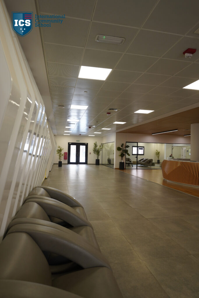 INTERNATIONAL COMMUNITY SCHOOL — Execution 1