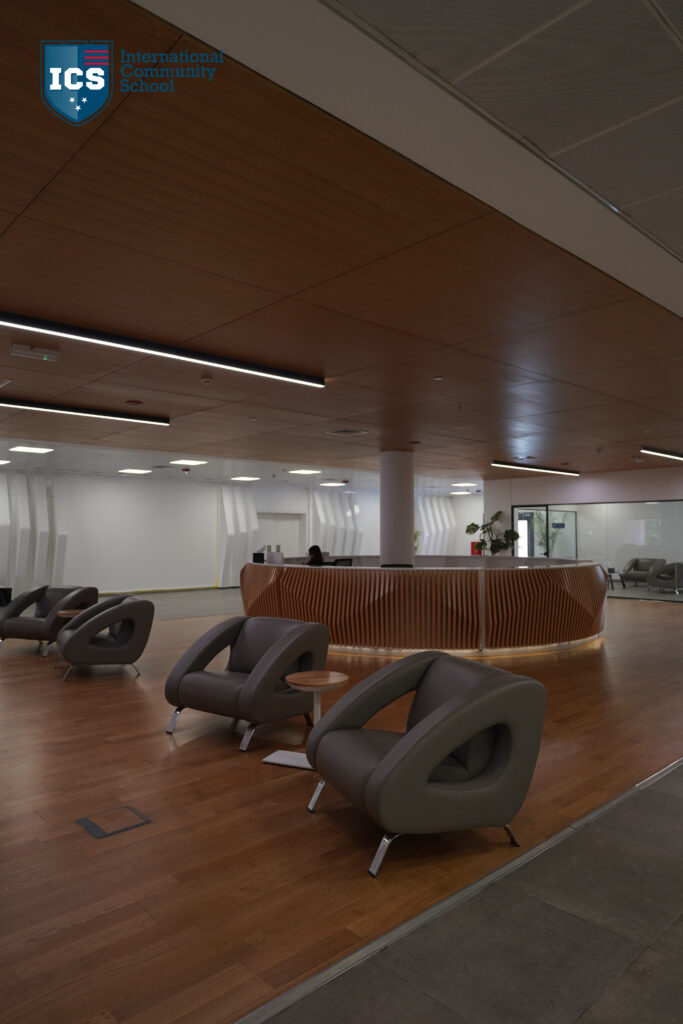 INTERNATIONAL COMMUNITY SCHOOL — Execution 6