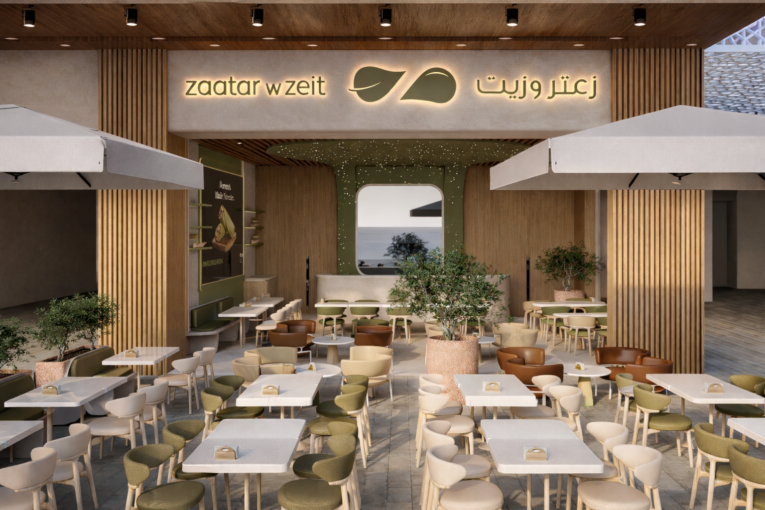 Zaatar w Zeit Kuwait facade with signage, planted roofline and terrace seating