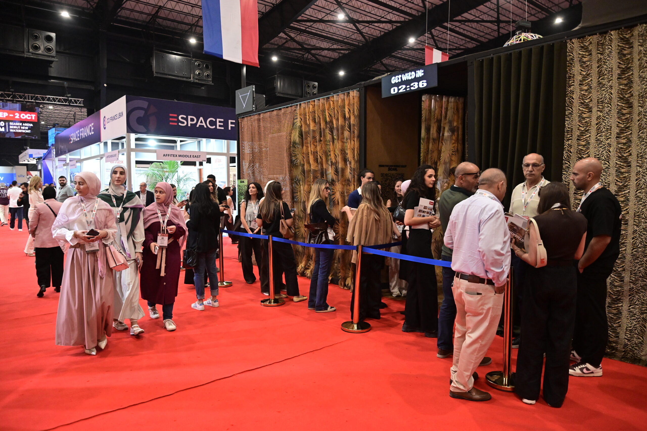 Visitors queuing for the immersive experience under the Get Wild In countdown