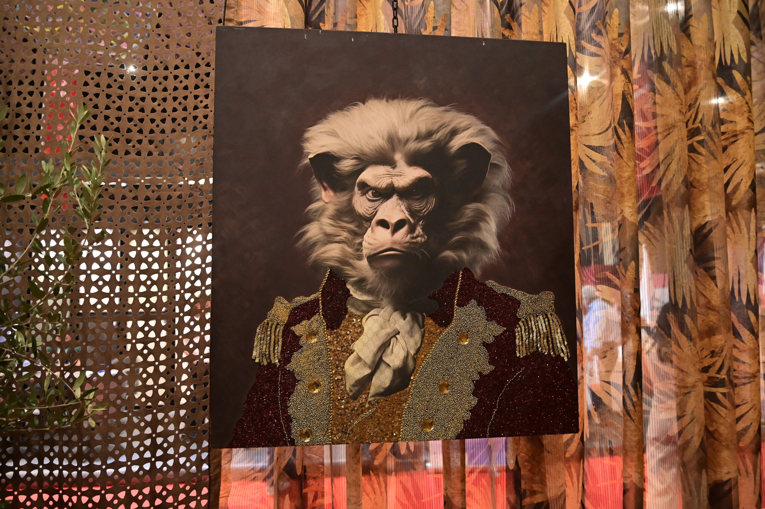 Animal portrait in period dress against palm-print curtains