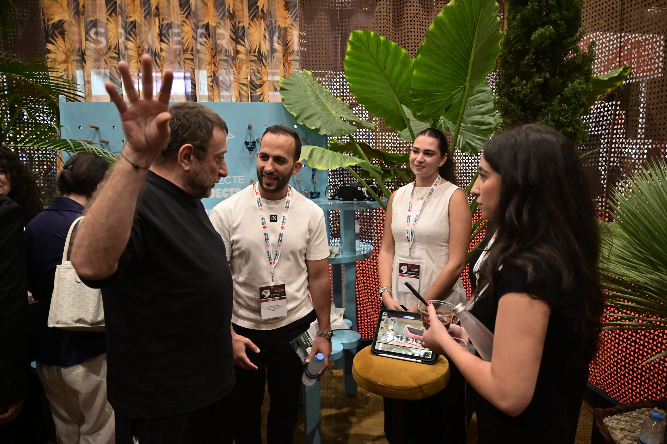 Conversations inside the L'Art-qui-tecte booth